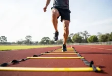 Athlete training on running track stockpack adobe stock